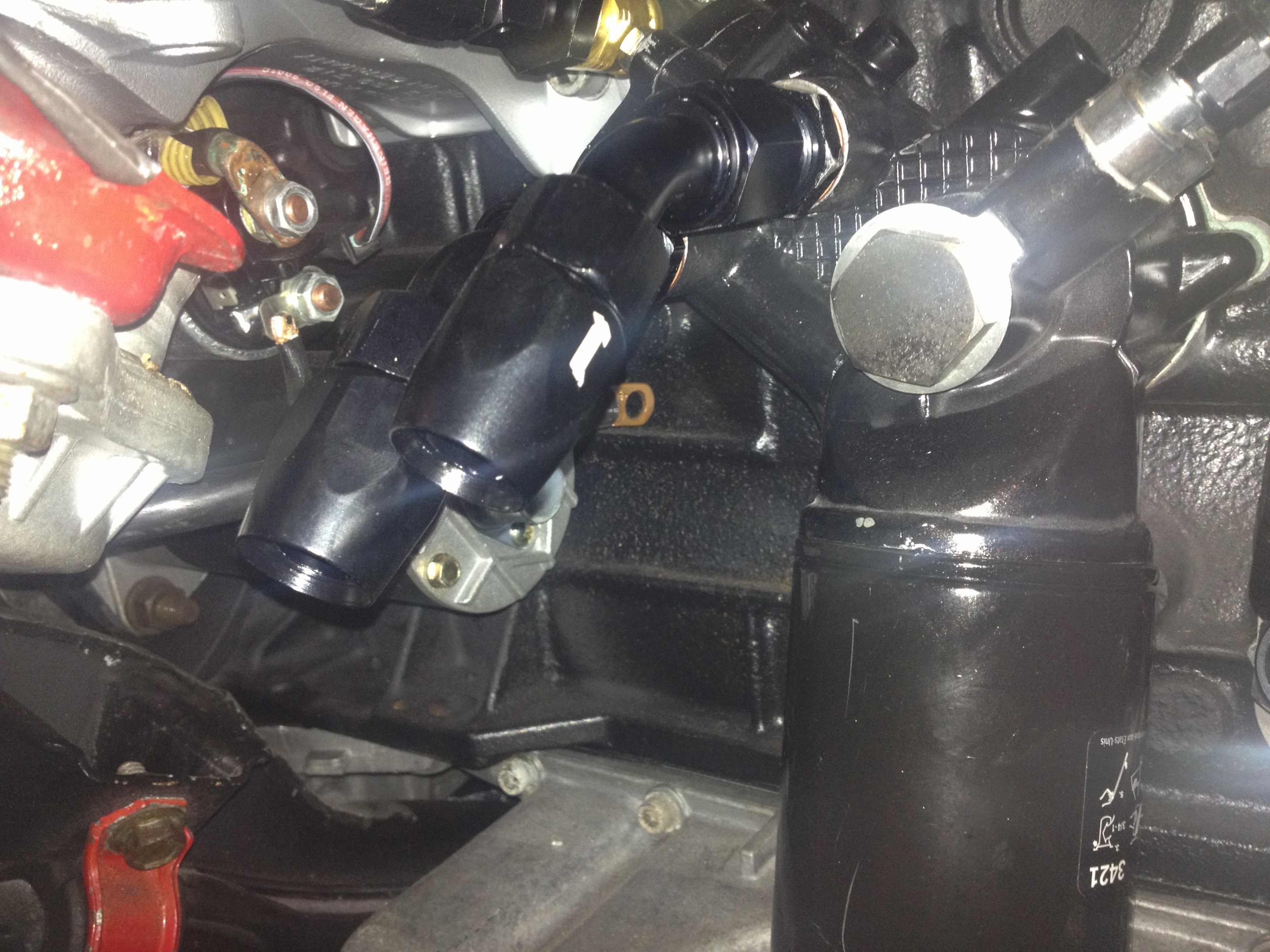 Sebastian's CQ91' oil filter housing restored.jpg