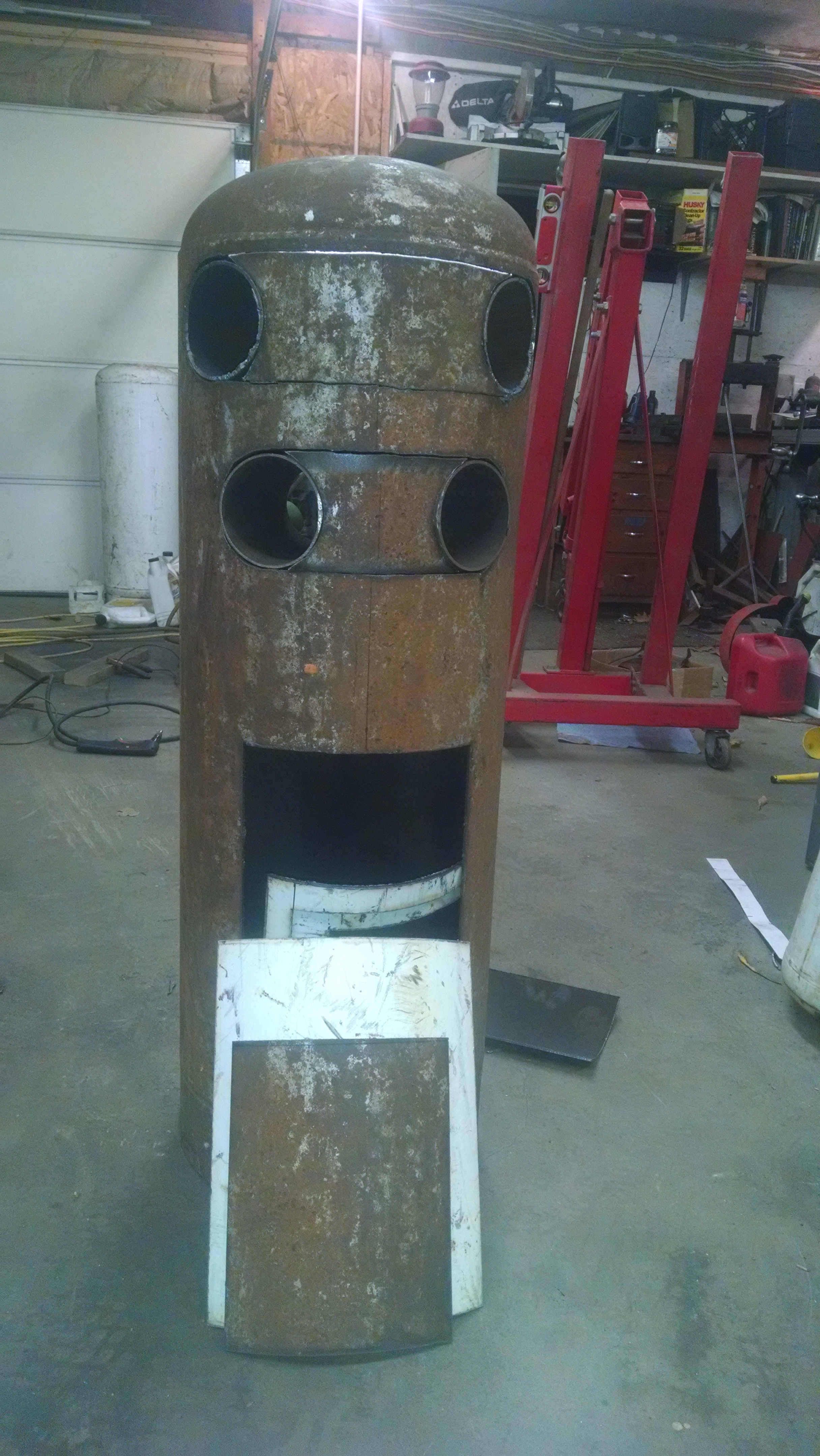 The through holes are oxygen tanks,  the are v's and exit the ctr of the back and will be hooked to duct work to pump air into the main room in my shop