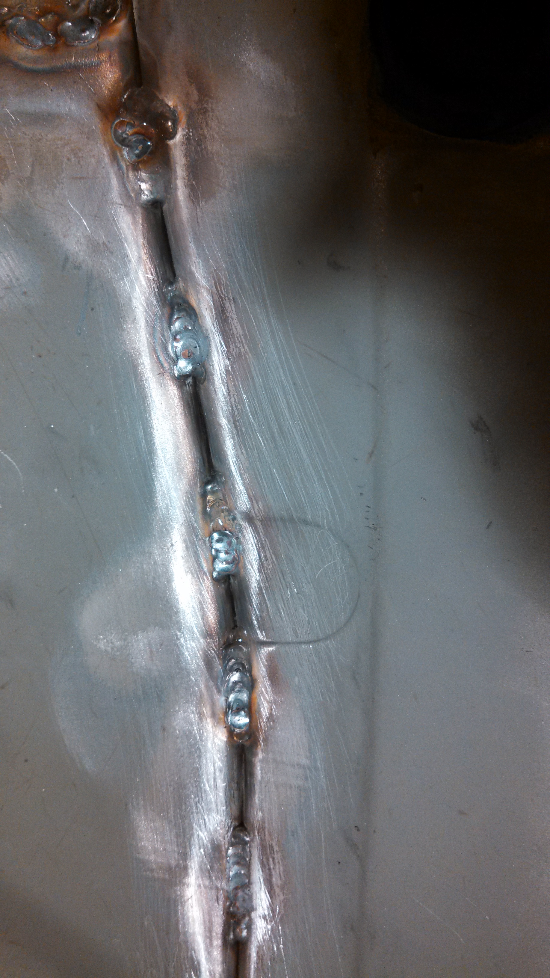 seam stiched pass rear wheel well.jpg