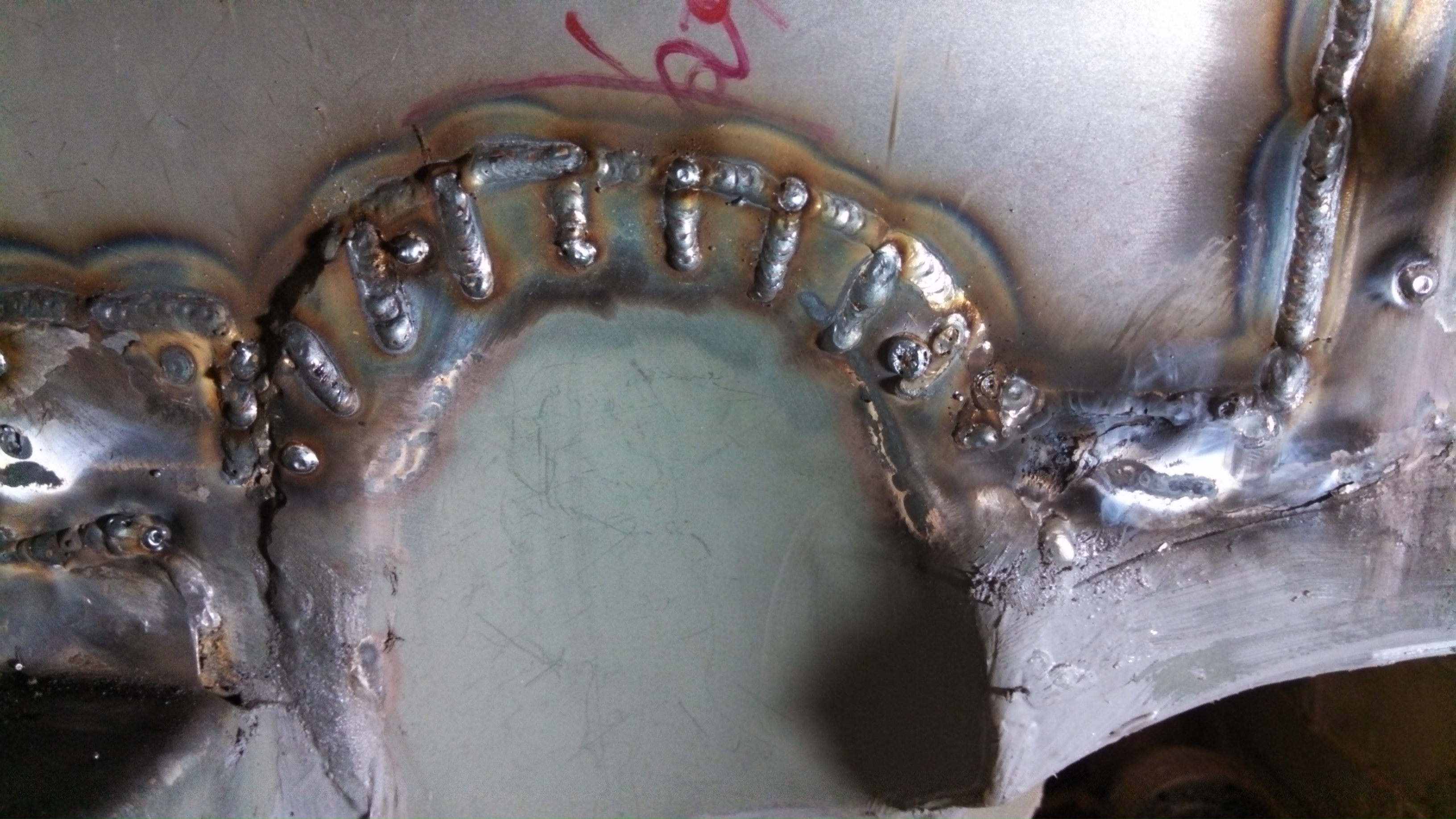 DP relief welded engine bay side upclose.jpg